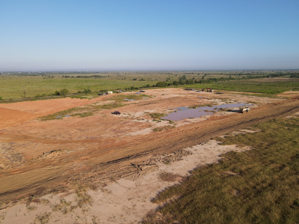 Aerial view of site clearing and grading
