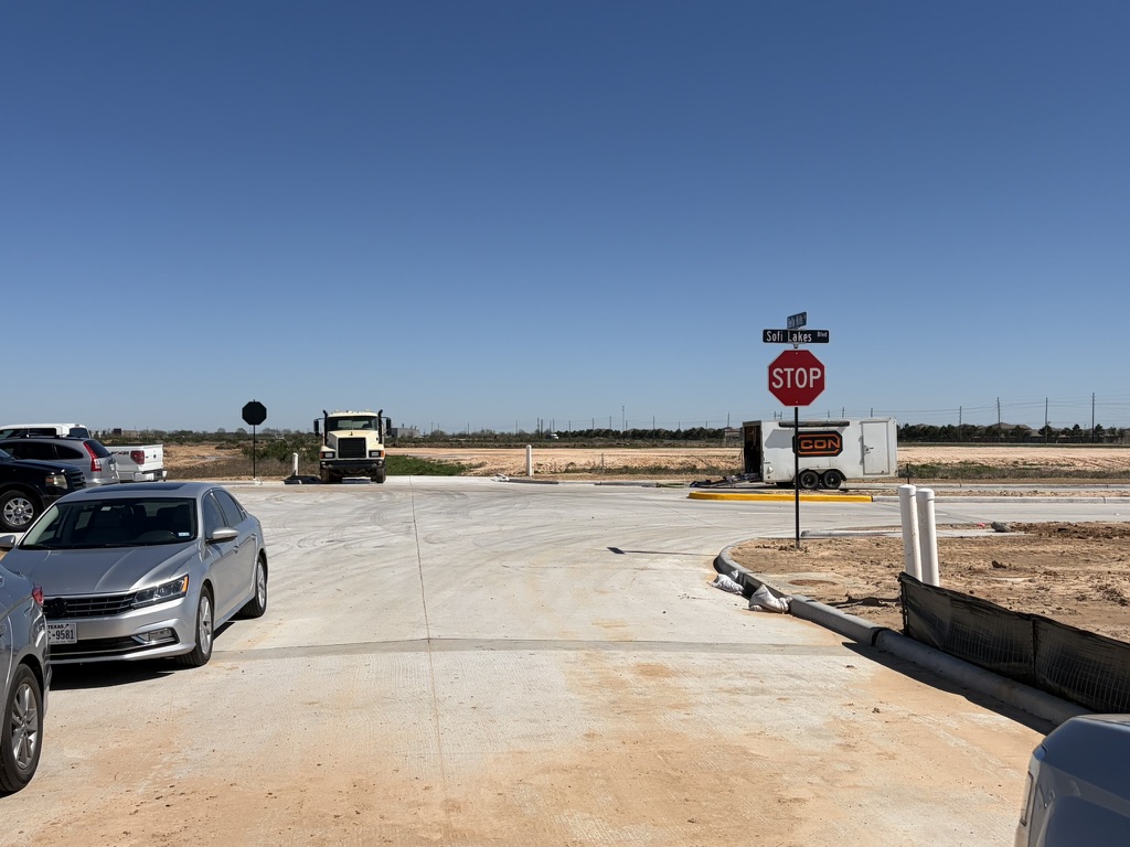 Boulevard intersection with new pavement and signage
